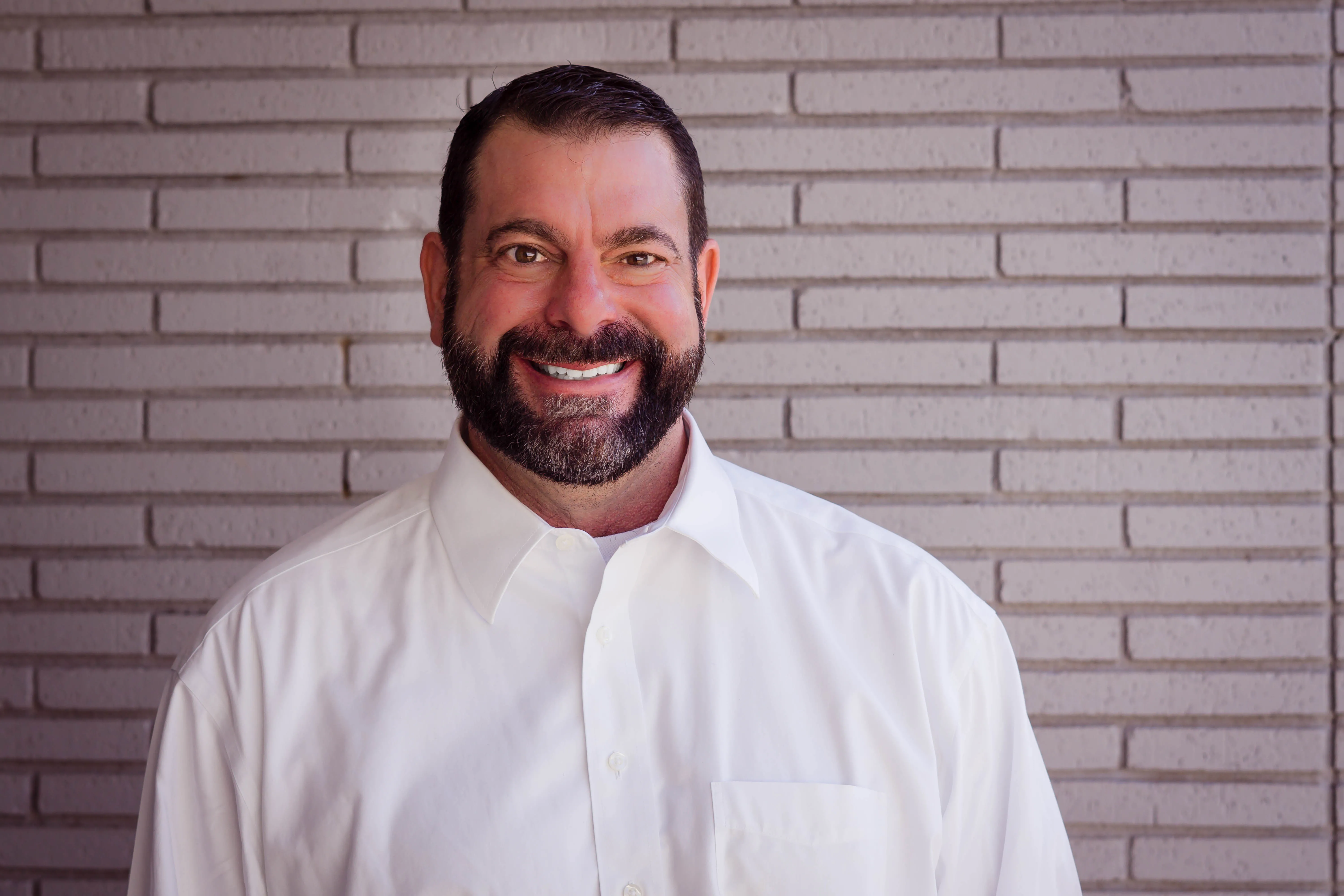 Cody Pirtle in white button up shirt.